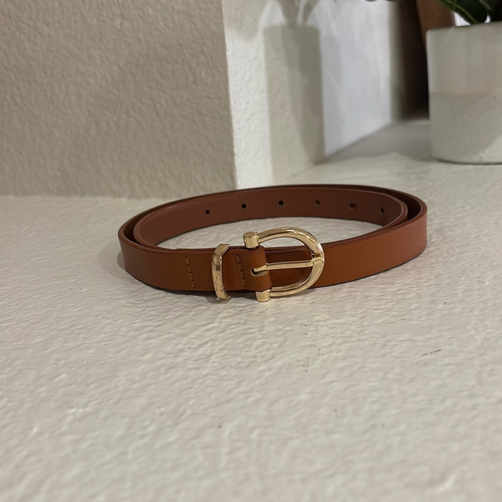 Tan belt with gold hardware